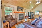 Charming Riverfront Cabin with Private Deck and Hot Tub