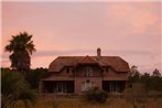 Habitacio?n en casa de campo a orillas de la Laguna de Rocha