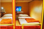 Woke Home Capsule Hotel