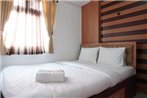 Homey and Warm 2BR Green Pramuka Apartment By Travelio