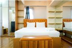 Furnished Studio with Comfortable Design Green Pramuka Apartment By Travelio