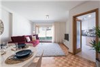 LovelyStay - Sunny & Central Apartment with Balcony & Garage